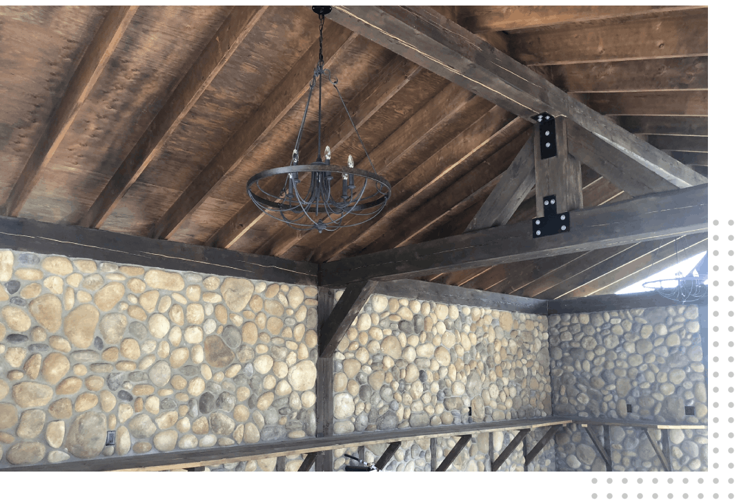 A Chandelier Hanging from a Weathered Roof